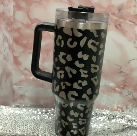 Title: Discover the Allure of Black Cheetah Print Cups Introduction Black cheetah print cups are the perfect blend of elegance and wild flair, making them a chic addition to your kitchenware collection. Whether you're a coffee enthusiast or a tea lover, these stylish cups can elevate your beverage experience. Let’s explore why black cheetah print cups are a trendy choice and how they can enhance your daily routine. Why Choose Black Cheetah Print Cups? One of the key reasons to opt for black cheetah print cups is their unique aesthetic. The bold yet sophisticated design complements a variety of home decor styles, from modern to bohemian. These cups can serve as a statement piece, making your morning coffee feel like a luxurious ritual. Additionally, the monochromatic color scheme allows them to fit seamlessly into any setting, whether you’re at home or in the office. Perfect for Gifts Looking for a stylish gift? Black cheetah print cups make for excellent presents for birthdays, holidays, or just because. They appeal to a wide range of tastes, making them suitable for friends, family, or colleagues. Pair them with gourmet coffee or artisanal tea for a thoughtful gift set that’s sure to impress. Their eye-catching design adds a touch of personality to any kitchen, making them not just functional but also decorative. Care and Maintenance Tips To keep your black cheetah print cups looking pristine, proper care is essential. Most ceramic cups can be safely placed in the dishwasher, but handwashing is recommended to maintain the vibrancy of the print. When cleaning, avoid using abrasive sponges that could scratch the surface. Additionally, letting your cups air-dry will help preserve their finish. By following a few simple care tips, your stylish cups can remain a staple in your kitchen for years to come. Conclusion Black cheetah print cups are more than just a fashionable drinkware choice; they are a fun way to express your personality while enjoying your favorite beverages. Whether you’re treating yourself or looking for the perfect gift, these cups are an excellent option. Dive into the world of stylish drinkware and discover how the right cup can make all the difference in your beverage experience!